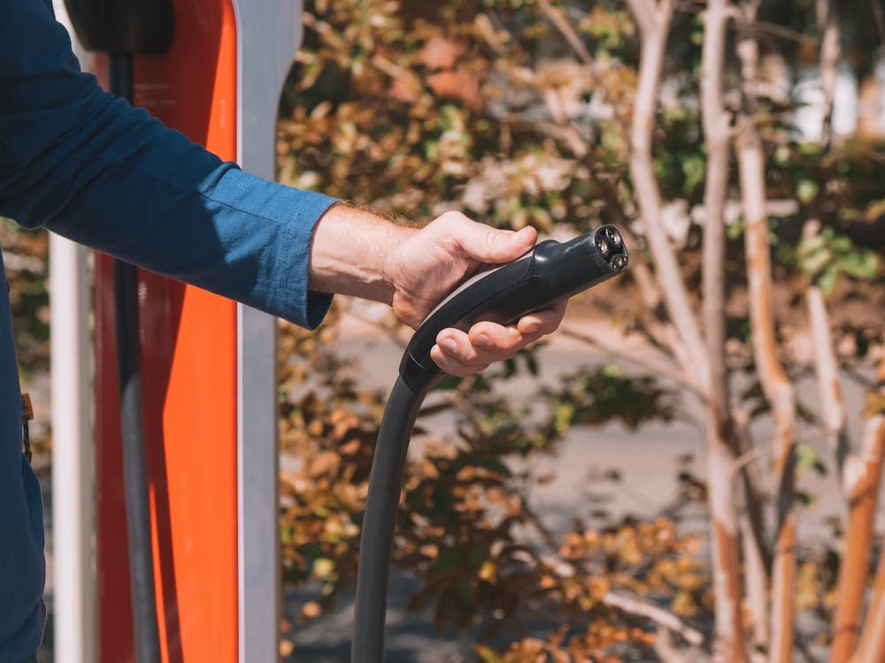 Free Person Holding Black Car Steering Wheel Stock Photo