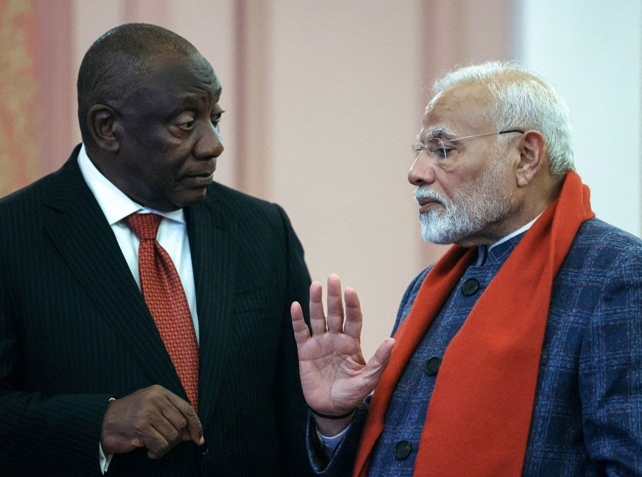 South African President Cyril Ramaphosa talks to Modi before at the BRICS Summit on Tuesday. (Mikhail Metzel/Reuters)