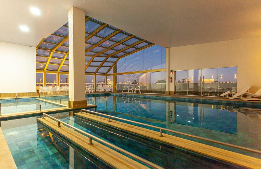 Travel Inn Caxias do Sul piscina coberta e lazer na Serra Gaúcha (Divulgação) Travel Inn Caxias do Sul piscina coberta e lazer na Serra Gaúcha (Divulgação)