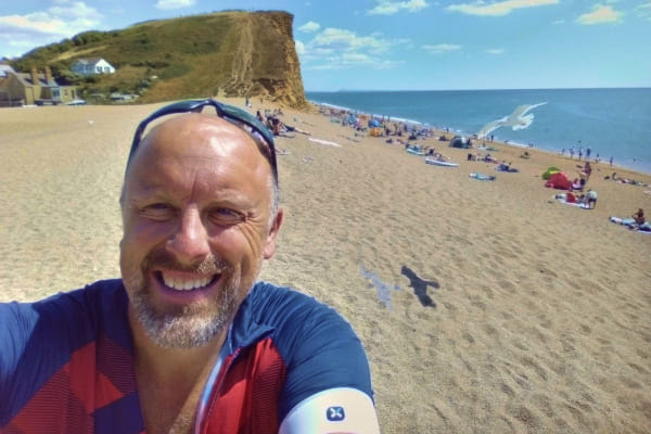 photo of man on a beach