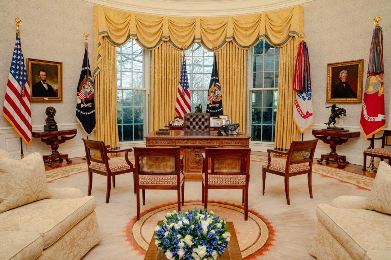 The Oval Office of President Trump includes a neutral carpet that was there in Trump’s first term.