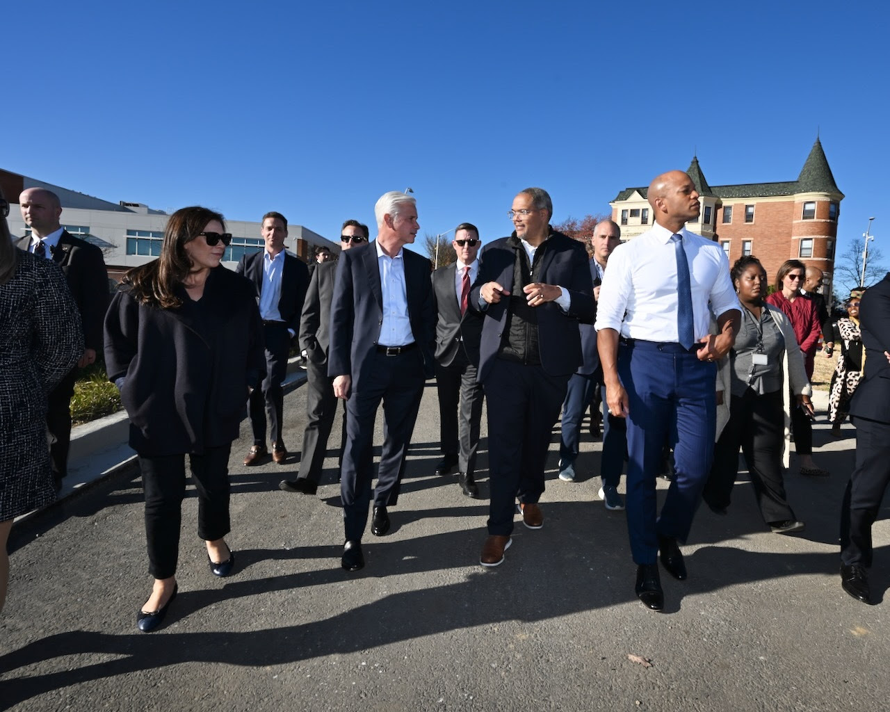 Governor Moore walking in Baltimore