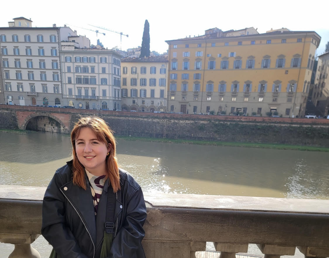 Pictured: Alison Trimbur with a scenic background of beautiful buildings