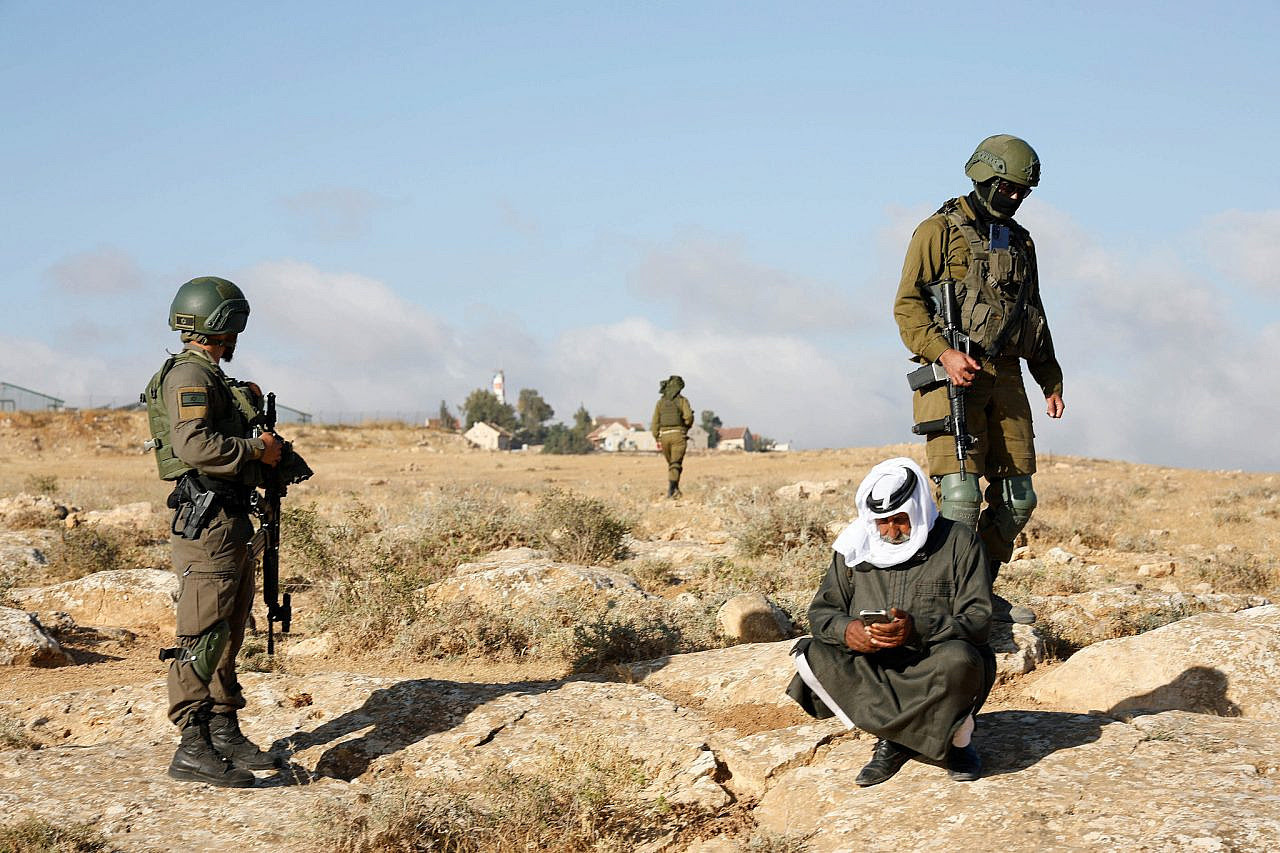 Israeli soldiers prevent the residents of the Palestinian village of Az-Zuweidin from grazing on their private pastures and arrest three Palestinians, southern occupied West Bank, May 4, 2024. (Omri Eran Vardi/Activestills)