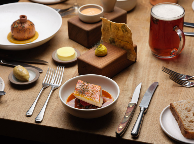 A table with plates and food on it