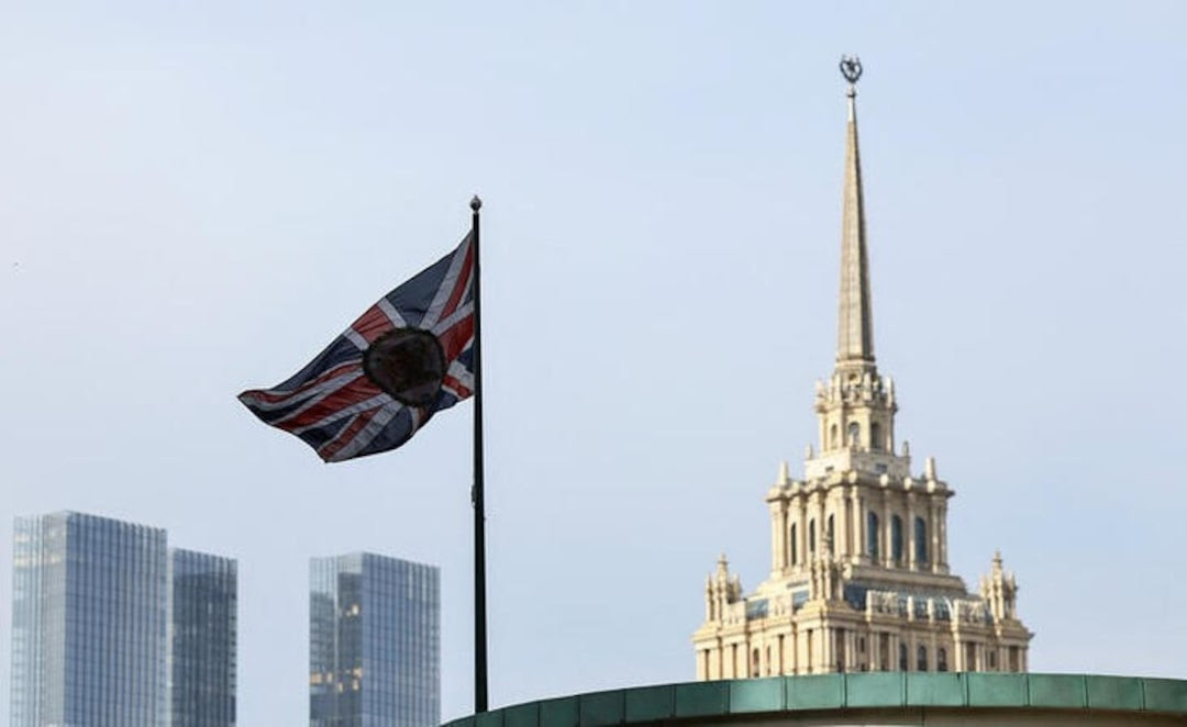 A flag flies above the British embassy in Moscow