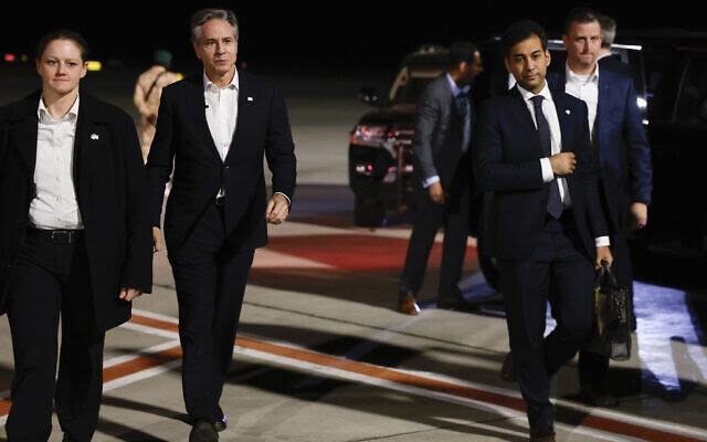 U.S. Secretary of State Antony Blinken walks on the tarmac before departing for Tel Aviv, during his week-long trip aimed at calming tensions across the Middle East, at the airport in Al Ula, Saudi Arabia, Monday, Jan. 8, 2024. (Evelyn Hockstein/Pool Photo via AP)