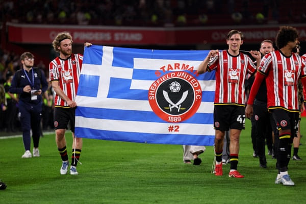 Sheffield United carry a Greece flag around in honour of their late former player, George Baldock.