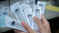 Image of various plastic syringes.