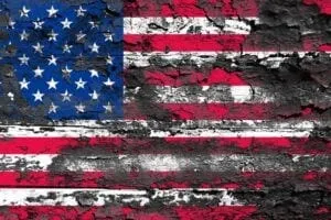 American flag with peeling paint