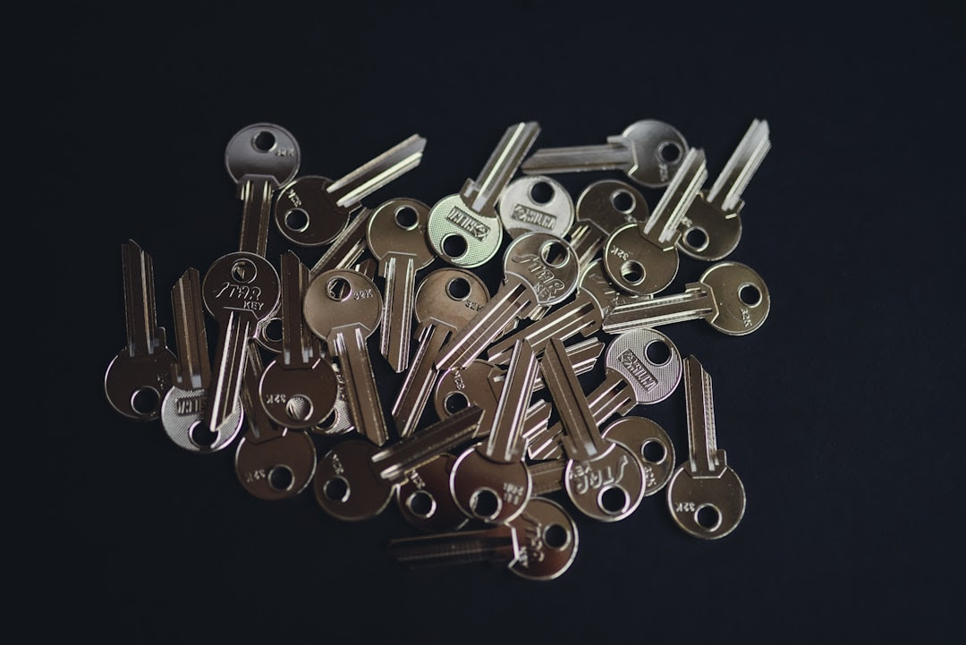 a pile of keys sitting on top of a table