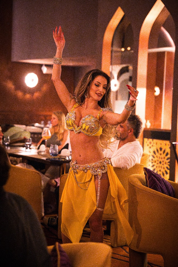 A person dancing in a restaurantAI-generated content may be incorrect. A person dancing in a restaurantAI-generated content may be incorrect.