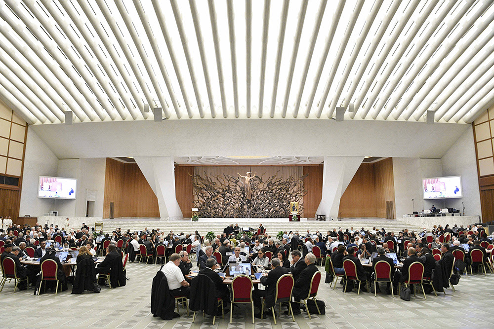 Members of the assembly of the Synod of Bishops gather for morning prayer Oct. 27, 2023, in the Paul VI Audience Hall at the Vatican. (CNS/Vatican Media)