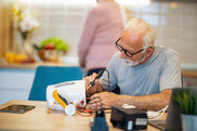 Person repairing a kettle