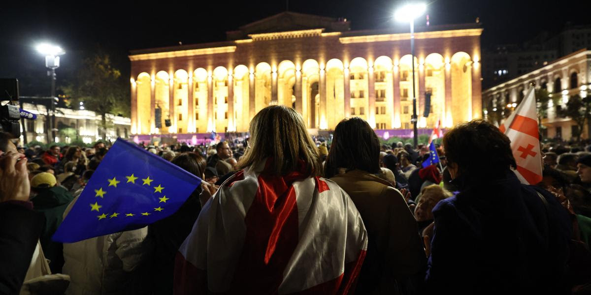 Georgian opposition supporters rally to protest results of the parliamentary elections that showed a win for the ruling Georgian Dream party, outside the parliament building in central Tbilisi on October 28, 2024. (Photo by Giorgi ARJEVANIDZE / AFP)