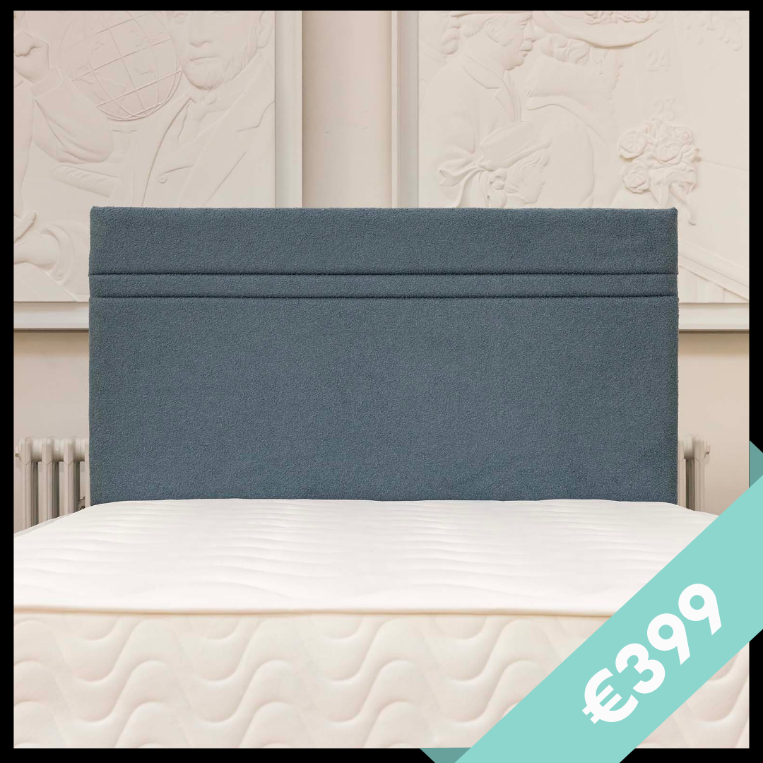 Square image with blue boucle fabric headboard and banner with €399 price tag