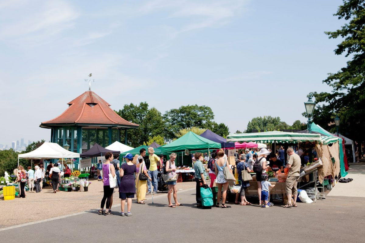 Stalls and visitors at the Horniman Market in the Gardens
