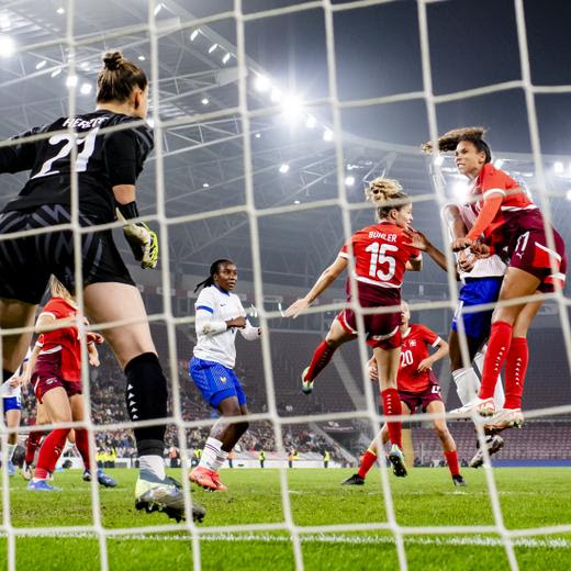 Switzerland's goalkeeper Elvira Herzog, left, Switzerland's defender Luana Buehler, center, Switzerland's midfielder Coumba Sow, right, in action during the women's international friendly soccer match between Switzerland and France at the Stade de Geneve stadium, in Geneva, Switzerland, Tuesday, October 29, 2024. (KEYSTONE/Jean-Christophe Bott)