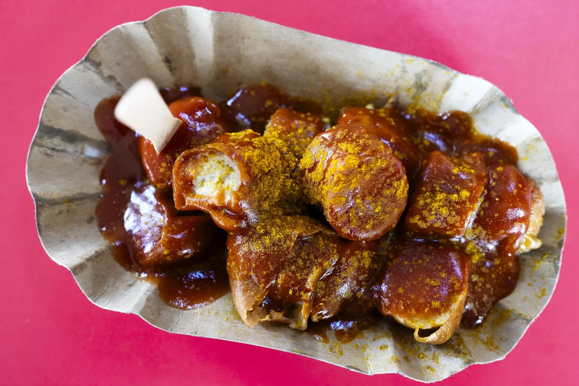 A plate of currywurst.