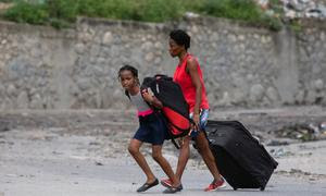 Los niños de todo el mundo se enfrentan a la amenaza de la violencia en situaciones de conflicto. (Niños en Haití en la foto)