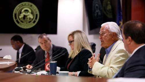 Georgia Public Service Commissioner Lauren McDonald (second from right) addresses at a commission meeting on May 16, 2023.