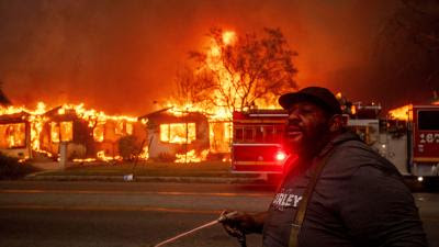 CARD_20250108_LosAngeles_Eaton_fire_burns_homes_AP25008811364082 image