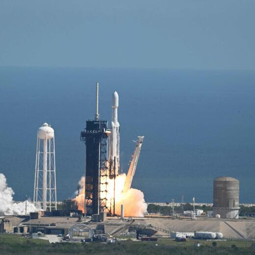 A SpaceX Falcon Heavy rocket with the Europa Clipper spacecraft aboard launches from Launch Complex 39A at NASA's Kennedy Space Center in Cape Canaveral on October 14, 2024. The spacecraft Clipper will soon launch for Jupiter's moon Europa, one of dozens of moons orbiting the Solar System’s biggest planet and the nearest spot in our celestial neighborhood that could offer a perch for life. It should reach orbit around Jupiter and Europa in 2031, where it will begin a detailed study of the moon scientists believe is covered in frozen water, which could provide a similar habitat to Earth. (Photo by CHANDAN KHANNA / AFP)