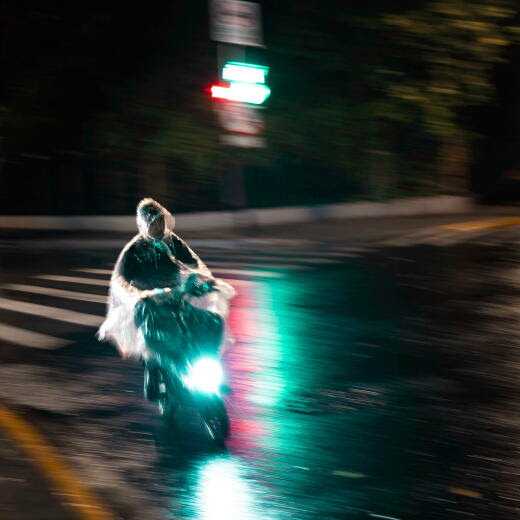 epa11606411 A man rides a scooter on a street during heavy rain amid Typhoon Bebinca in Shanghai, China, 16 September 2024. Shanghai, China's financial hub, has closed its seaports and canceled over 600 flights in preparation for Typhoon Bebinca, expected to be the strongest tropical storm to hit the city in 75 years. More than 377,000 people were evacuated, and the Mid-Autumn Festival's mood has been dampened by the potential for up to 10 inches of rain. EPA/ALEX PLAVEVSKI