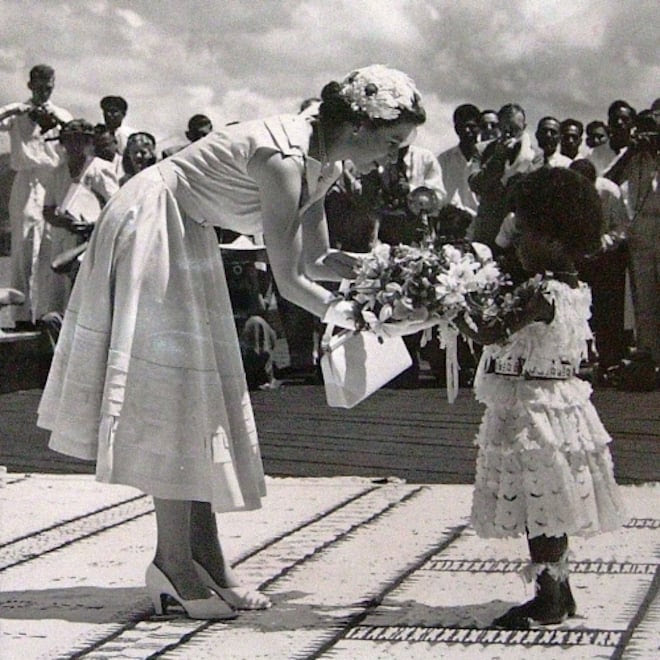 Queen Elizabeth II presented with a bouquet of Fijian flowers