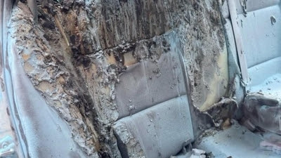Dos policías salvan a una niña de 3 años de un coche en llamas en Canillas