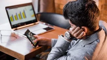 Man Procrastinating in Office