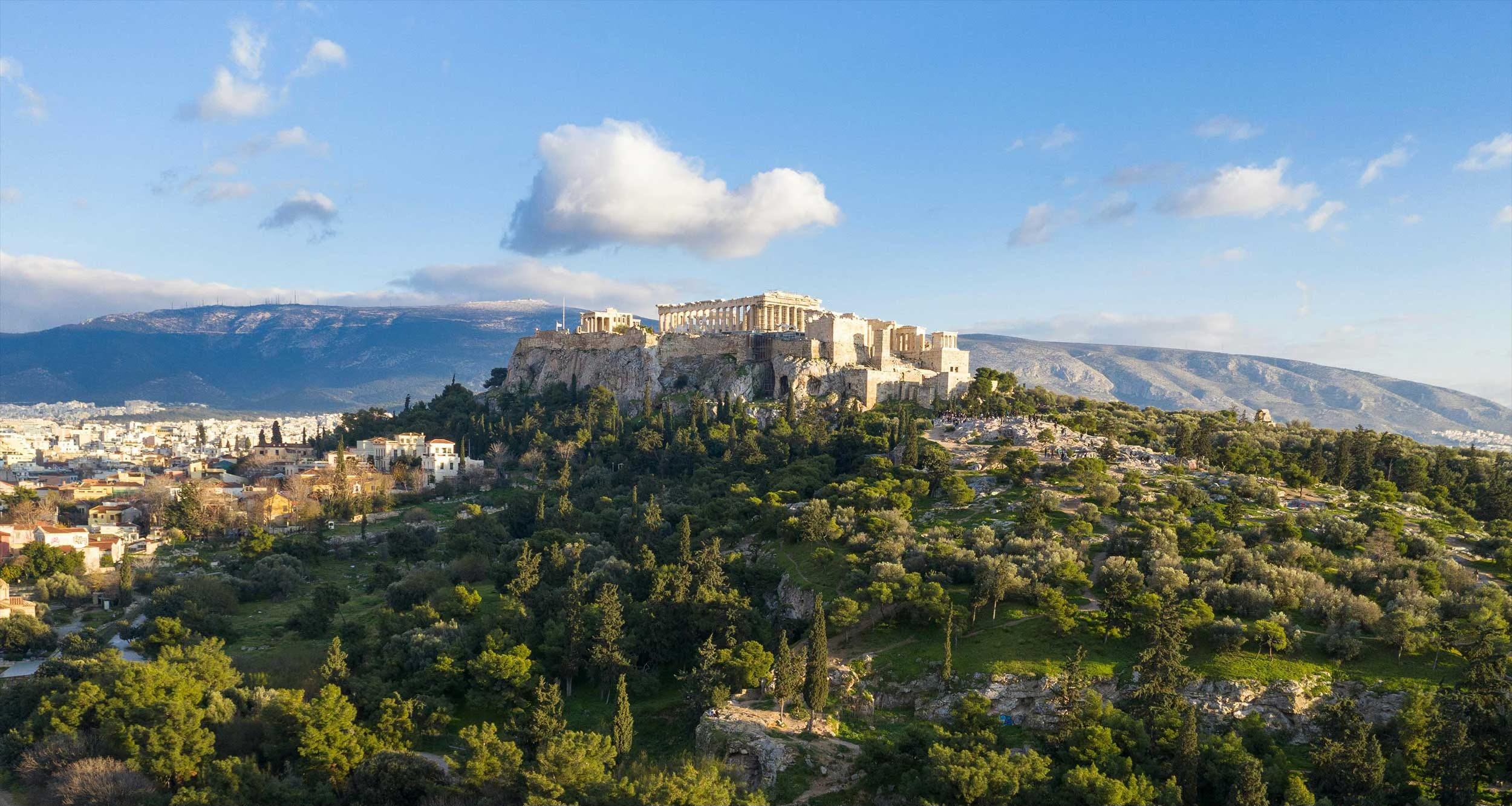 Skyline of Athens Greece with the Acropolis seen on the hilltop.