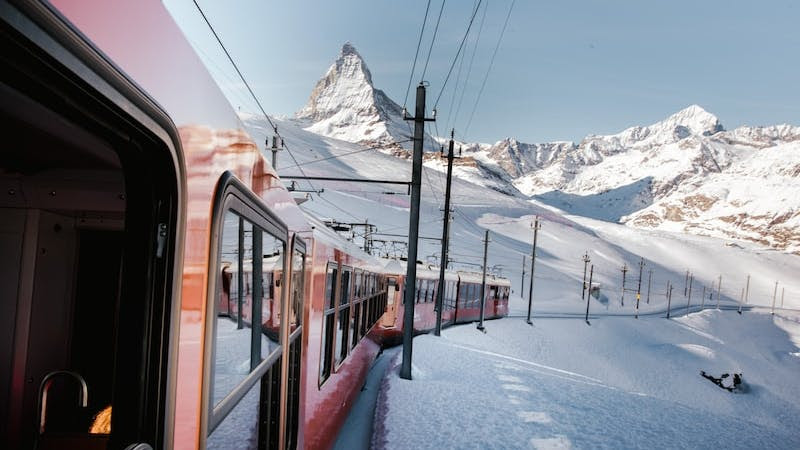 train moves between snowfield