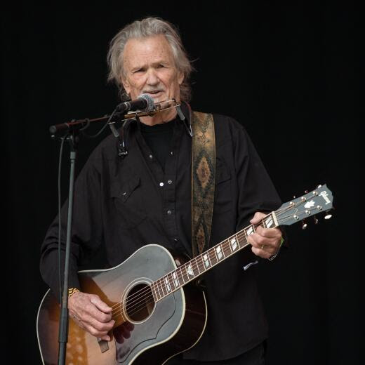 (FILES) Kris Kristofferson performs on the Pyramid Stage at the Glastonbury Festival of Music and Performing Arts on Worthy Farm near the village of Pilton in Somerset, south-west England on June 23, 2017. US singer-songwriter Kris Kristofferson, a country music legend who notably hit the silver screen opposite Barbra Streisand in "A Star is Born," has died at the age of 88, his family announced Sunday. (Photo by OLI SCARFF / AFP)