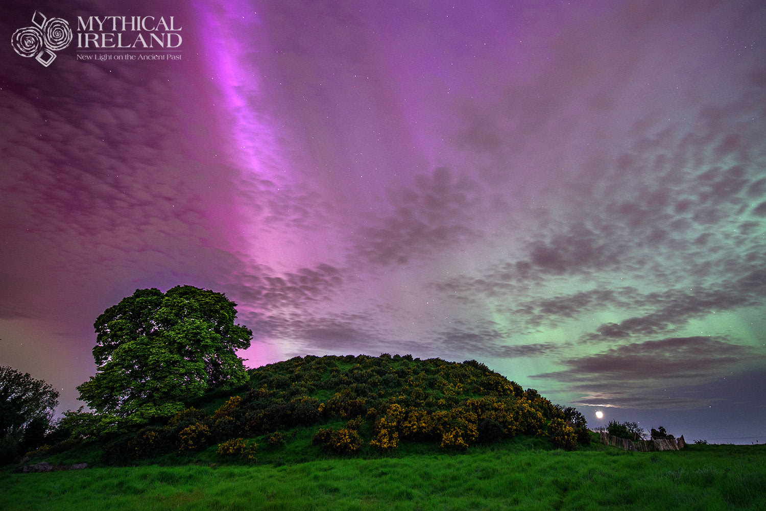 Aurora borealis over the Neolithic cairn of Dowth