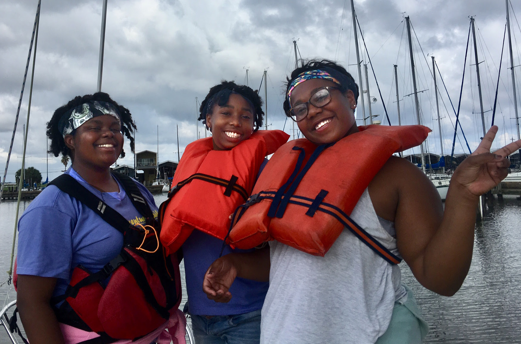 Three happy girls after an AdventureSail in New Orleans. 