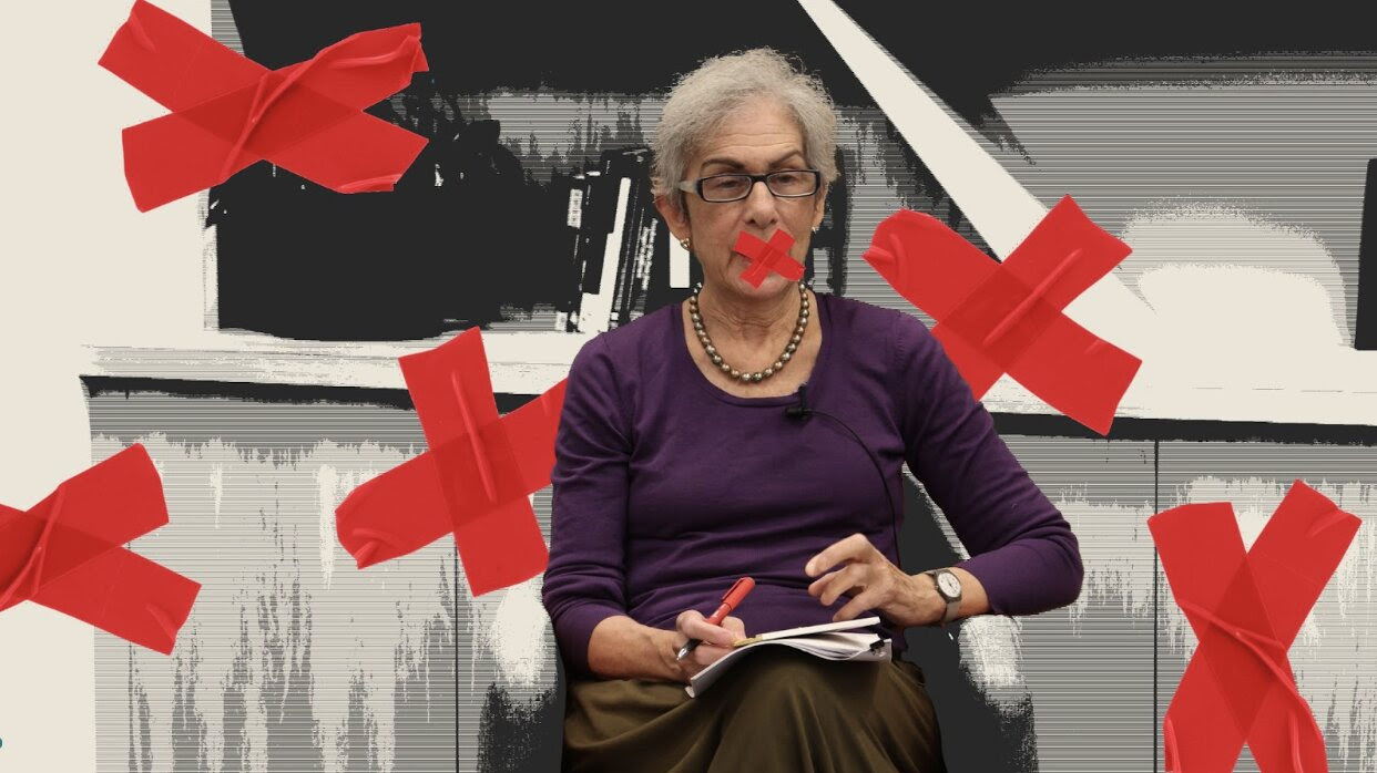 Image of Amy Wax with red Xs