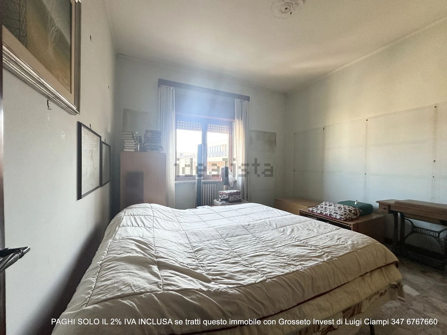 Camera da letto del grande appartamento in vendita a Grosseto, in Via Agostino Depretis