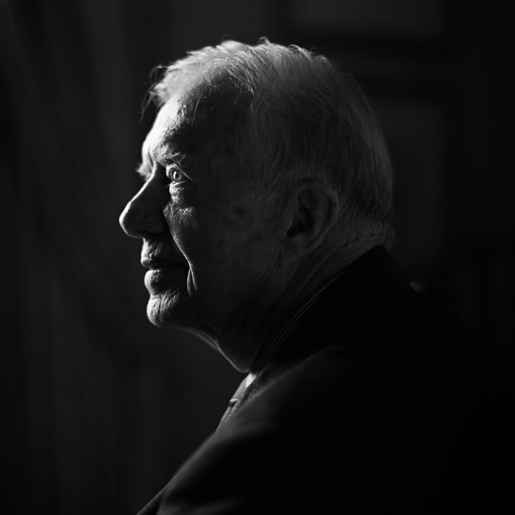 A black and white profile of former President Jimmy Carter, in October of 2007.