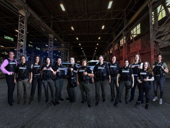 The Clark County Sheriff's Department's 13 female deputies pose for a picture.