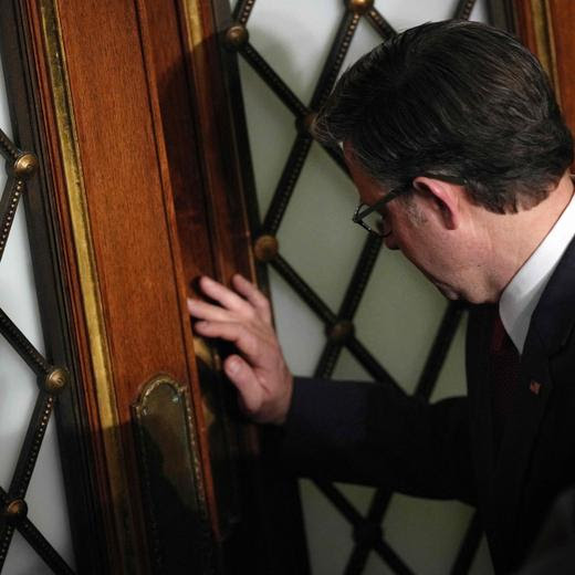 WASHINGTON, DC - JANUARY 03: U.S. Rep. Mike Johnson (R-LA) leaves the floor after the House failed to elect a Speaker of the House in the first vote on the first day of the 119th Congress in the House Chamber of the U.S. Capitol Building on January 03, 2025 in Washington, DC. Rep. Johnson is working to retain the Speakership in the face of opposition within his own party as the 119th Congress holds its first session to vote for a new Speaker of the House. Andrew Harnik/Getty Images/AFP (Photo by Andrew Harnik / GETTY IMAGES NORTH AMERICA / Getty Images via AFP)