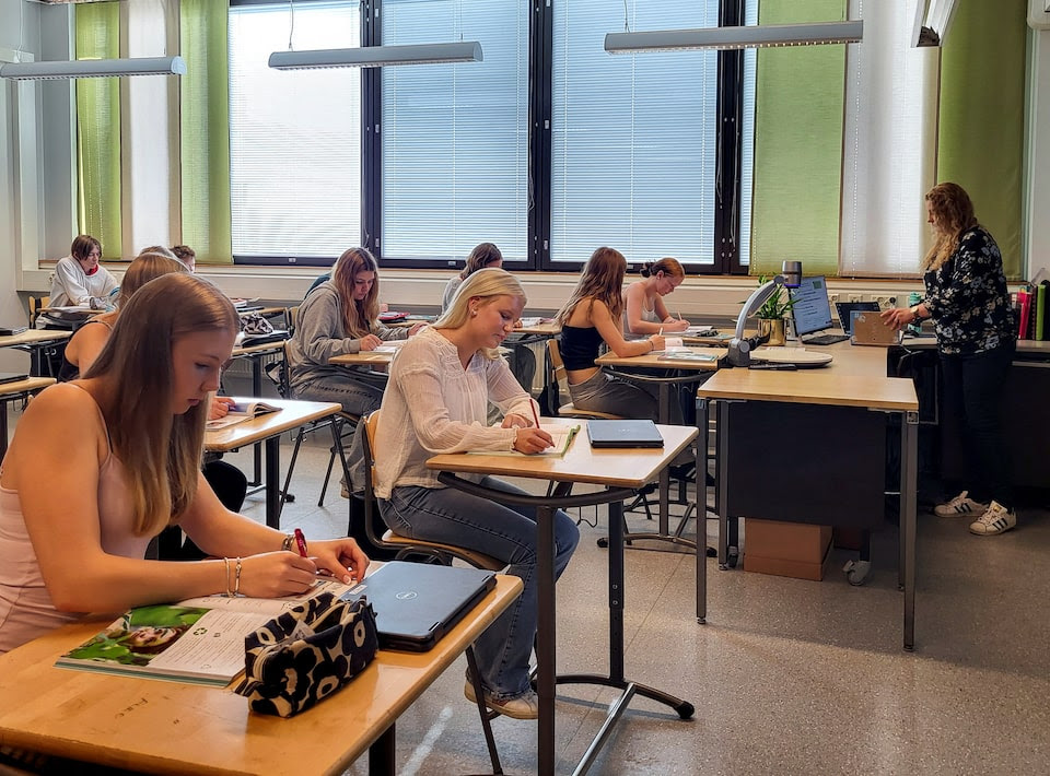 Pupils follow an English language lesson at Pohjolanrinne middle school in Riihimaki, Finland, September 6, 2024.