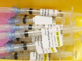 COVID-19 vaccine syringes