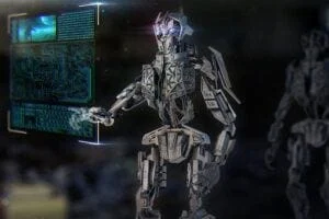 Futuristic looking robot looking at a video monitor