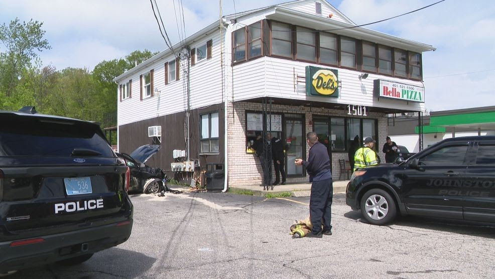 Car crashes into side of building in Johnston