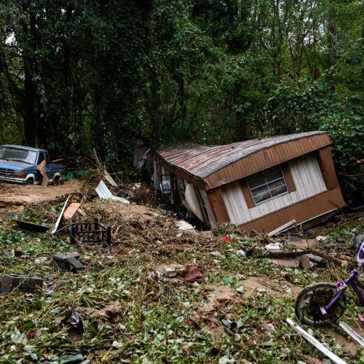 OLD FORT, NORTH CAROLINA - SEPTEMBER 29: Debris and a mobile home are piled up along a tree line in the aftermath of Hurricane Helene on September 29, 2024 in Old Fort, North Carolina. According to reports, more than 60 people have been killed across the South due to the storm, and millions have been left without power. North Carolina has been approved for a Federal Major Disaster Declaration. Melissa Sue Gerrits/Getty Images/AFP (Photo by Melissa Sue Gerrits / GETTY IMAGES NORTH AMERICA / Getty Images via AFP)