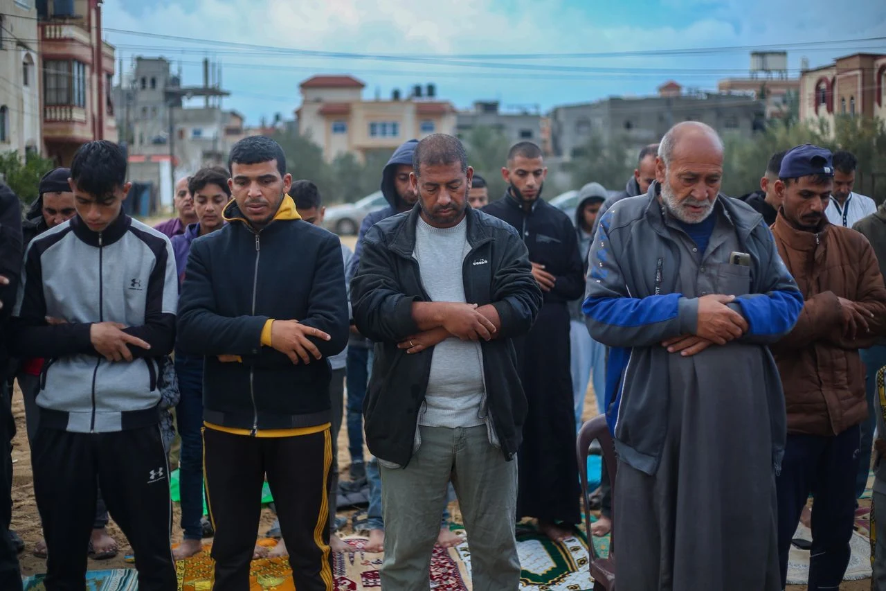 Displaced Palestinians offer Eid al-Fitr prayers in a displaced-persons camp in Rafah, Gaza. (Ahmad Hasaballah/Getty Images)