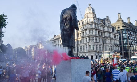 Smoke flares on the Churchill statue in Parliament Square, London.
