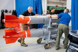 Two B61-12 joint test assembly units are prepared for shipping at Sandia’s Weapon Modernization Lab. The last production unit of the nuclear gravity bomb was completed at the Pantex Plant in December.