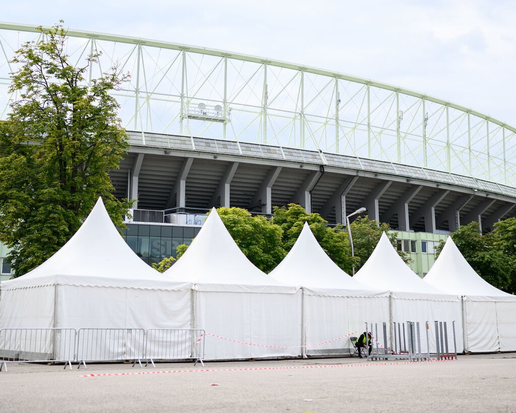 A stadium with shuttered stands. 